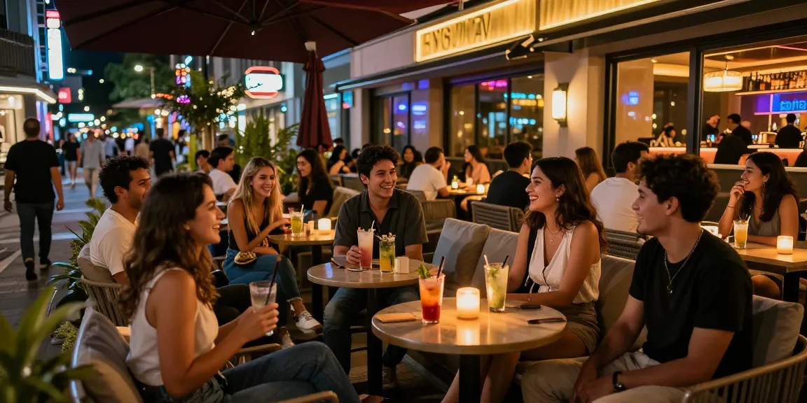 Engaging nightlife vibe at an 오피사이트, showcasing lively groups enjoying drinks in a trendy urban setting.